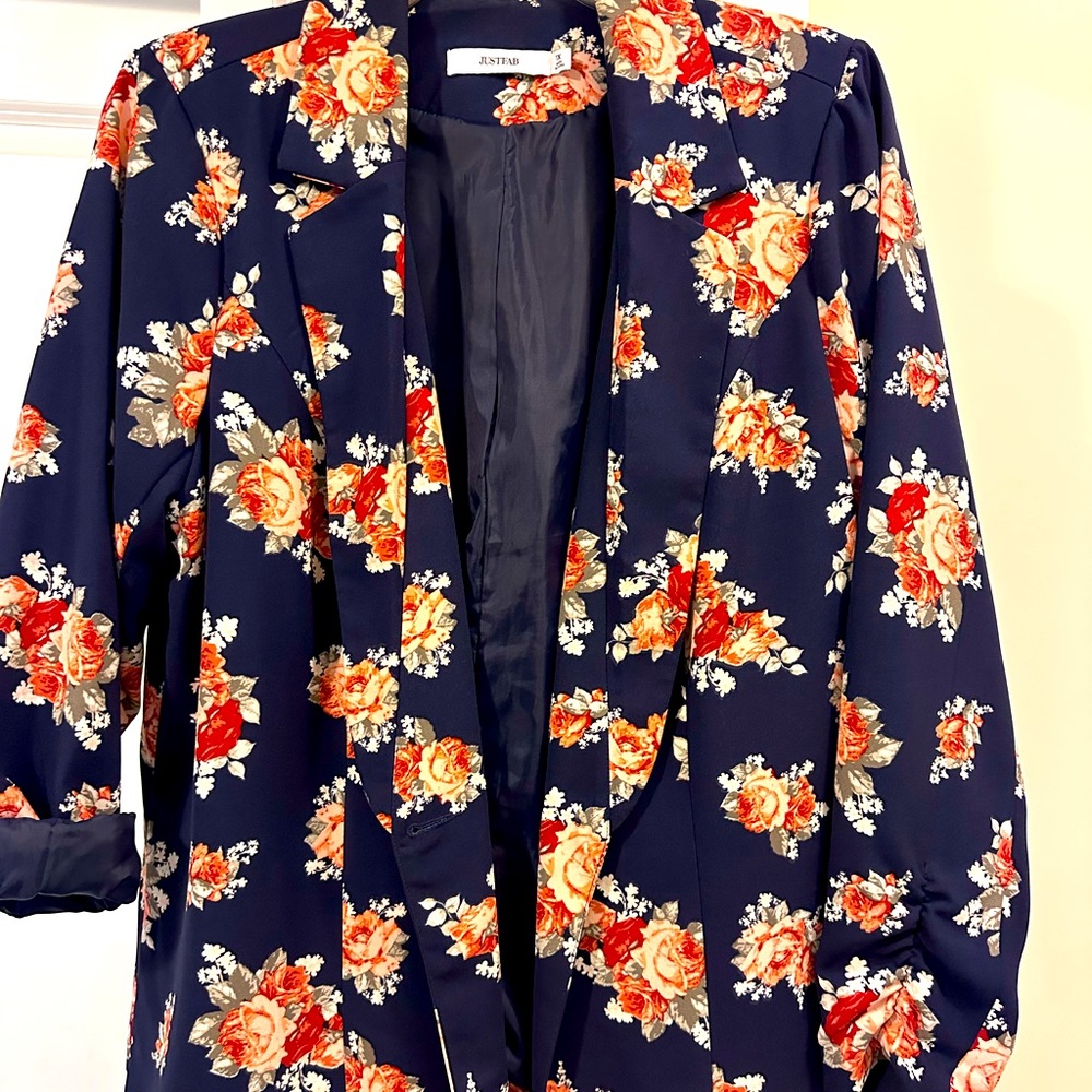 Fun blazer rayon feel great for spring